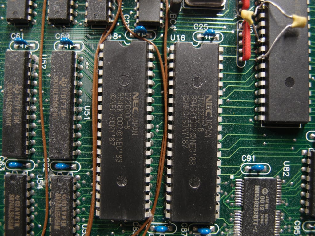 a pair of NEC μPD72020C-8 chips